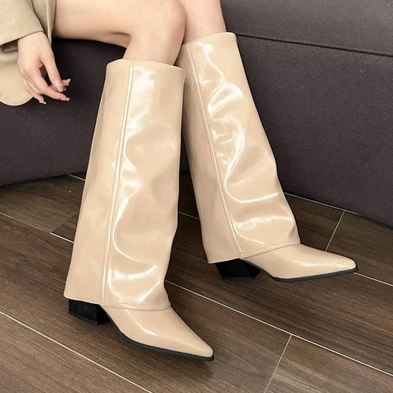 Botas altas de piel con tacón grueso